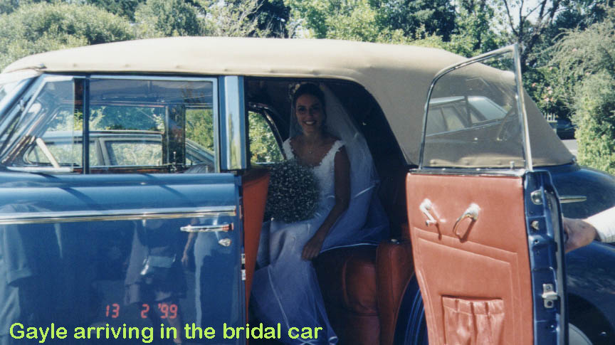 Gayle in bridal car copy.jpg (92420 bytes)